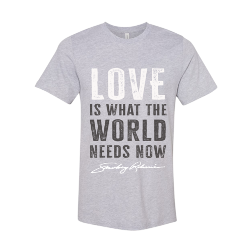 Gray t-shirt with 'LOVE IS WHAT THE WORLD NEEDS NOW' text on a white background